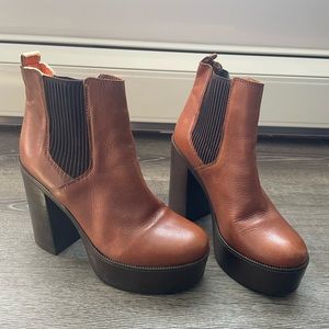 Brown Steve Madden platform booties.